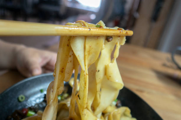 istock eating spicy gravy noodles 1150252558