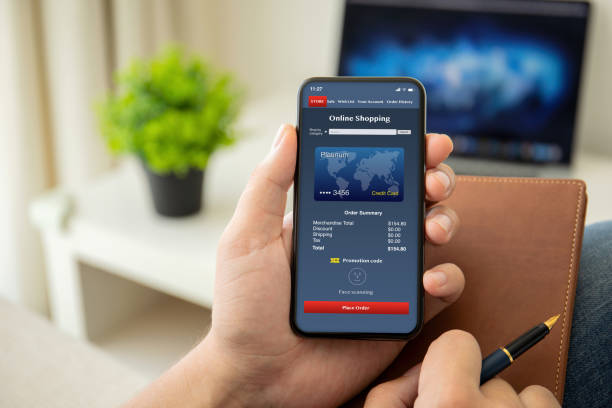 istock man hands holding phone with online shopping on the screen 1150252587