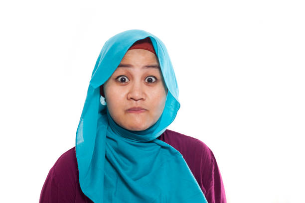 Portrait of smiling muslim woman outdoors