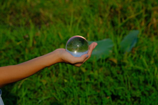 istock Looking at the world and nature through crystal ball 1150256340