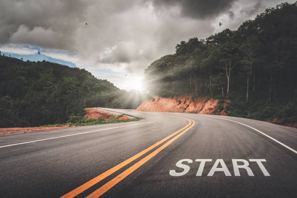 start point on the road of business or your life success. the beginning to victory. - restarting imagens e fotografias de stock