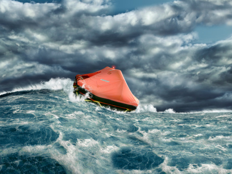 Life raft in stormy ocean