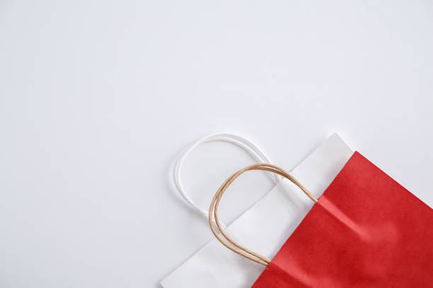 istock red paper bag on white background. top view 1150262976