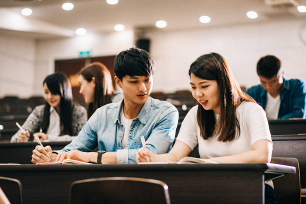 istock Young post-graduate students in East Asia - multi-ethnic environment in classroom. 1150265694