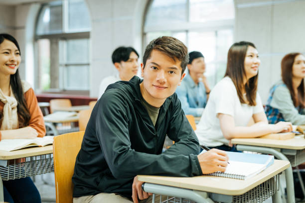 istock Post graduate student in Asia attending class with other students 1150267605