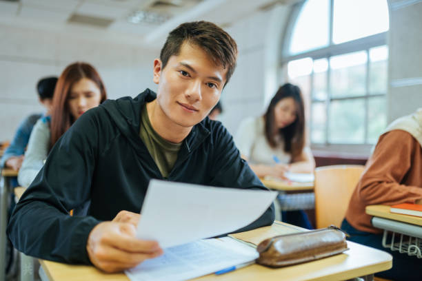 istock Post graduate students in Asia passing exams in first semestre. 1150269915