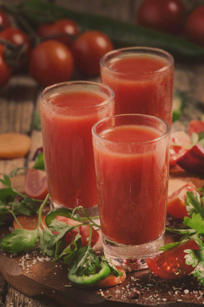 istock Diet vegetable and tomato juice, fresh food and drinks, selective focus 1150269985