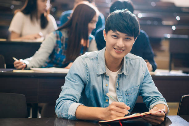 istock Handsome millennial student in lecture hall in Taiwan. 1150270943