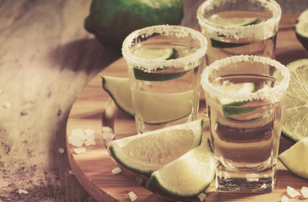 istock Silver Mexican tequila with lime and salt, selective focus 1150272035