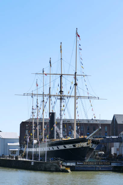 Bristol, England March 17 2019: The original passenger steam ship SS Great Britain taking pride of place in Bristol’s harbourside, with its rigging dwarfing the surrounding buildings