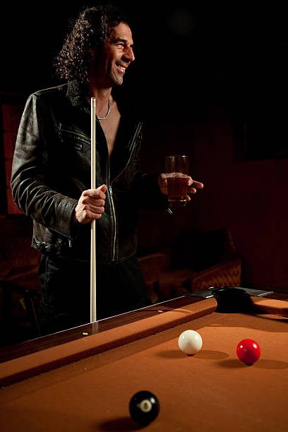 Pool Player Man playing pool at a bar. pool at the crook stock pictures, royalty-free photos & images