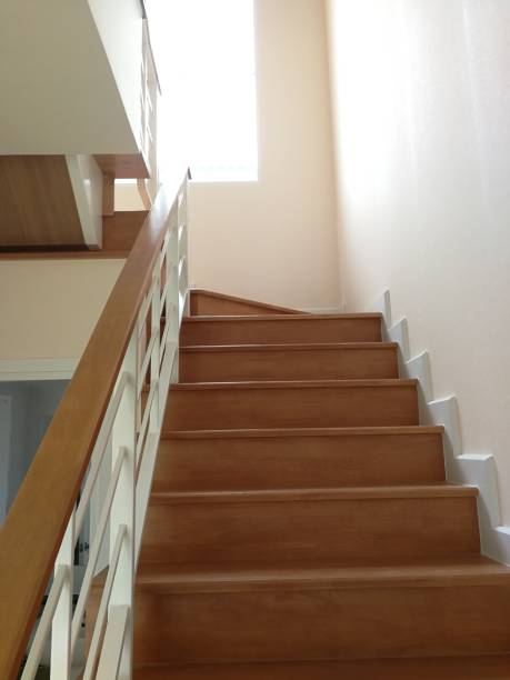 istock Elegant and wooden stairs 1150281253