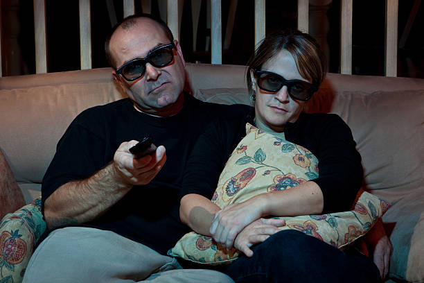 Couple Watching TV with 3D Glasses