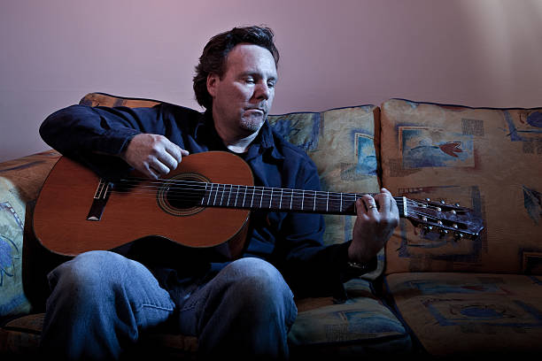 istock Musician guitar player playing guitarist 115028176