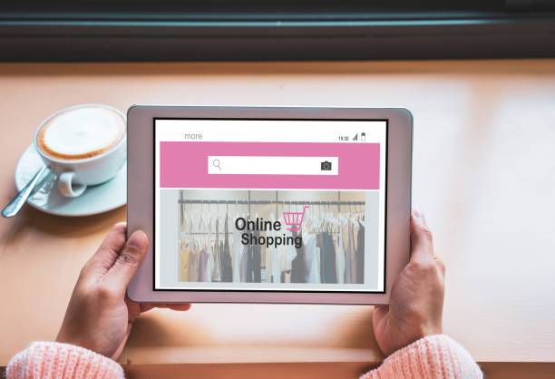 istock Online Shopping Website on digital tablet.Young woman hands using digital tablet. Online shopping concept. 1150284432