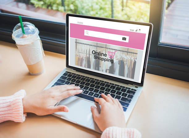 istock Young woman shopping online 1150284434