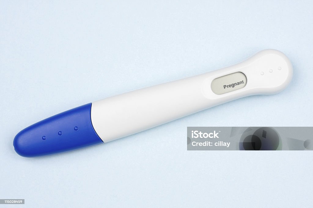 Positive Pregnancy Test Positive pregnancy test on a blue background.  YOU MIGHT ALSO LIKE: Pregnancy Test Stock Photo