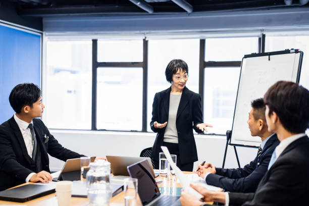 istock Senior businesswoman giving a presentation 1150285697