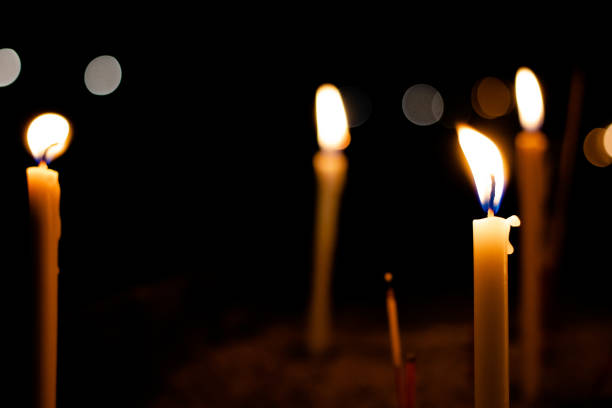 istock Closeup on Candle light in the dark 1150285830