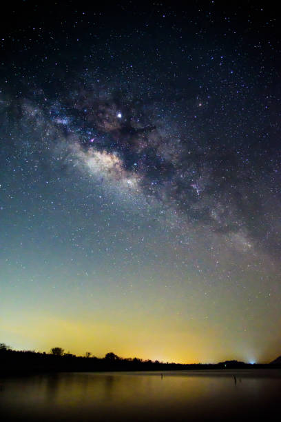 istock Milky way at the lake view in night time 1150286397