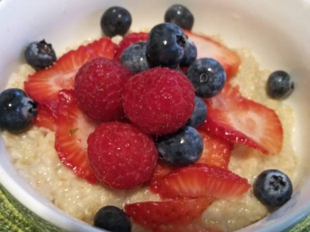 istock Oatmeal breakfast - Mixed berries oatmeal - healthy breakfast - no cholesterol 1150288878