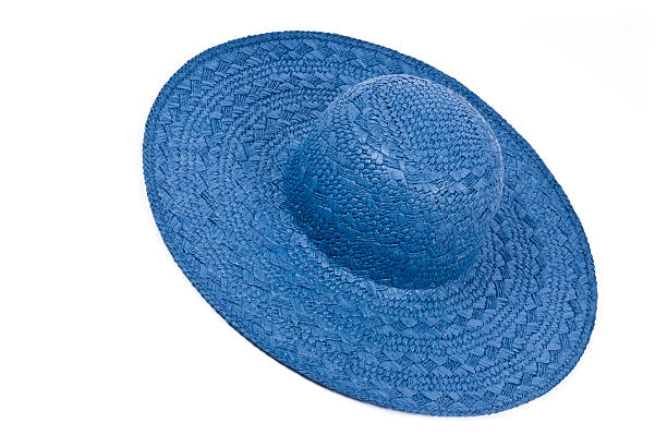 istock A blue straw hat against an isolated white background. 115029305