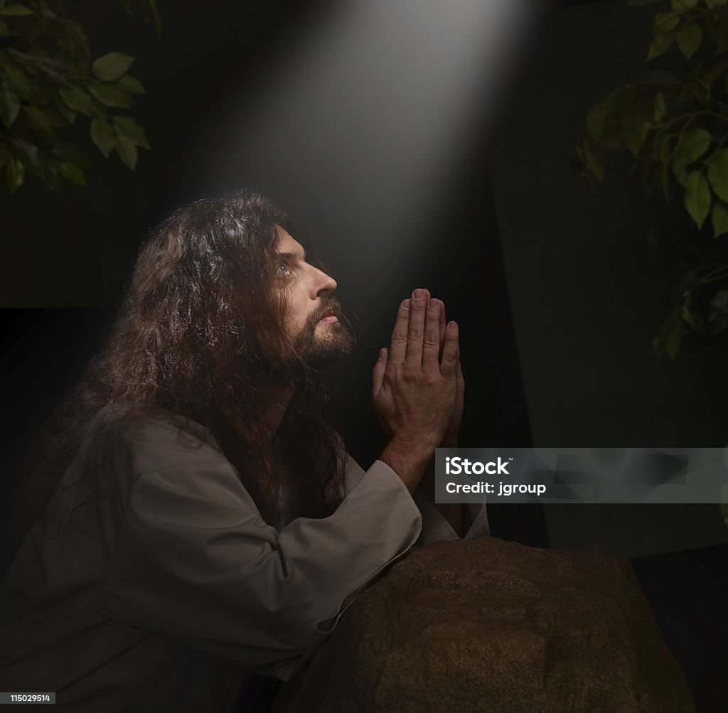 Jesus in Gesthemene Jesus praying in the Garden of Gesthemene Jesus Christ Stock Photo