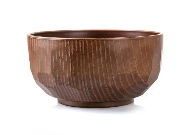 Japanese-style wooden bowl on a white background.