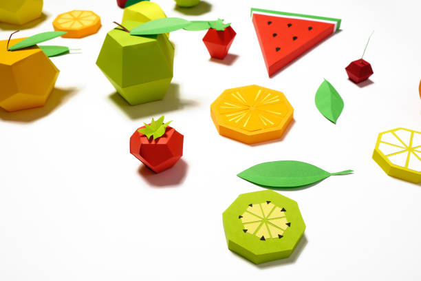 istock exotic fruit made of paper on white background. 1150297067