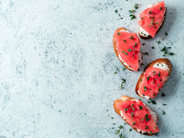 istock Toasts with watermelon, soft cheese and thyme 1150297571