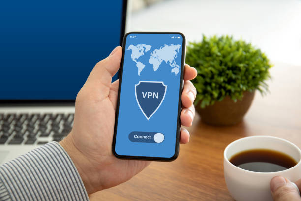 istock male hands holding phone with app vpn on the screen 1150298937