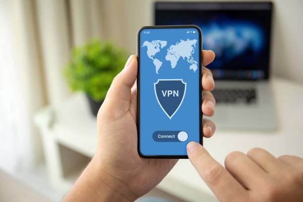 man hands holding phone with app vpn on the screen man hands holding phone with app vpn on the screen in the house in room vpn stock pictures, royalty-free photos & images