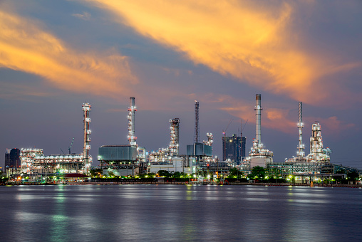 Oil refinery with reflection, petrochemical plant , Bangkok , Thailand