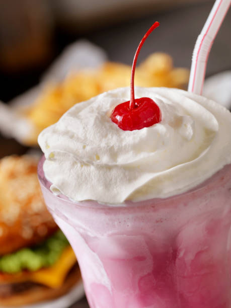 istock Strawberry Milkshake with a Burger and Fries 1150301446