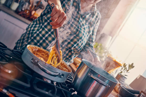 istock Preparing Spaghetti Bolognese in Domestic Kitchen 1150304854