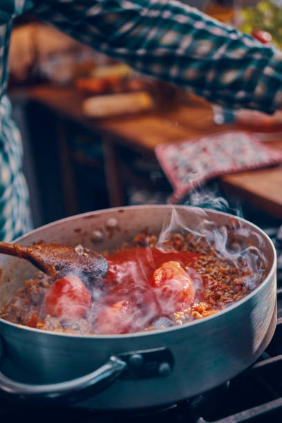 istock Preparing Spaghetti Bolognese in Domestic Kitchen 1150304867