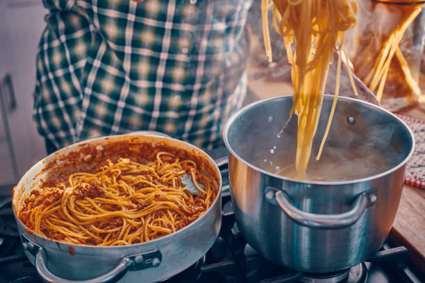 istock Preparing Spaghetti Bolognese in Domestic Kitchen 1150304868