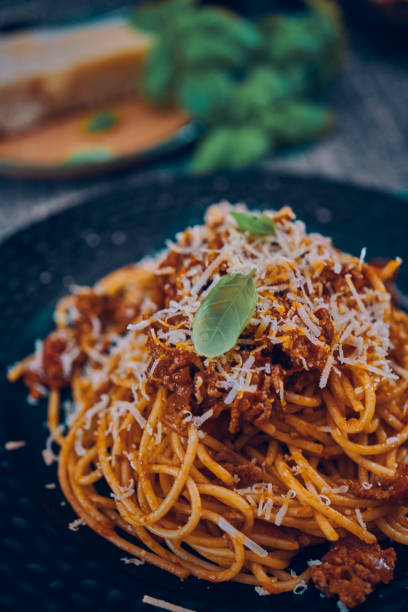 istock Spaghetti Bolognese with Fresh Basil and Parmesan 1150304871