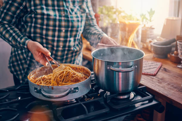 istock Preparing Spaghetti Bolognese in Domestic Kitchen 1150304873