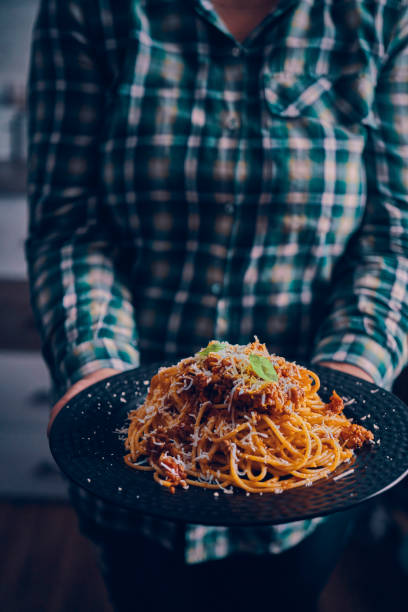 istock Spaghetti Bolognese with Fresh Basil and Parmesan 1150304875