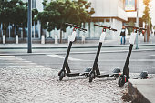 istock Three electric scooters outdoors 1150304928