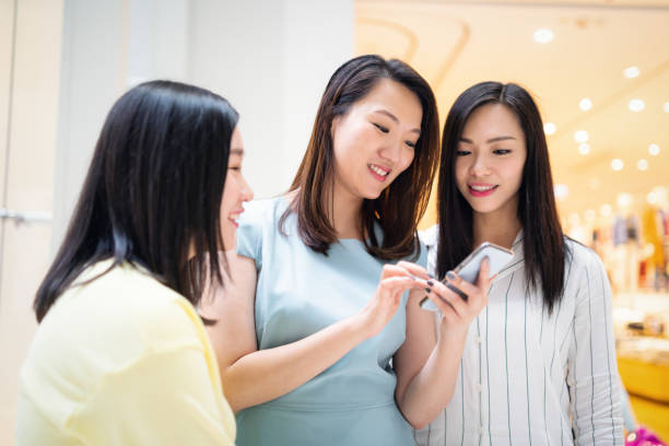 istock Asian young women using a smartphone 1150305152