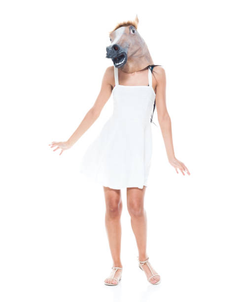 istock Cute female wearing a horse head 1150305253