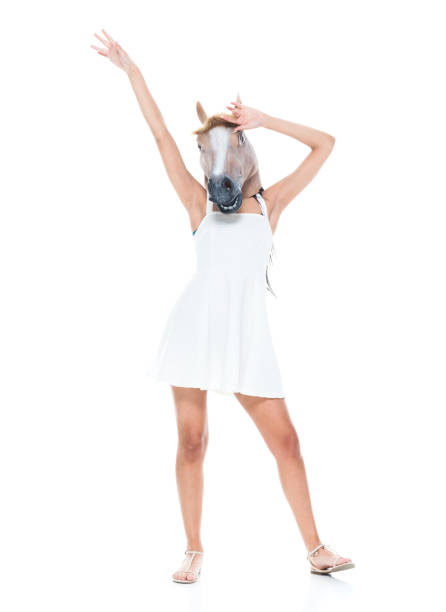 istock Cute female wearing a horse head 1150305269