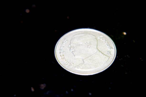 istock Coins of Thailand bath 1150305281