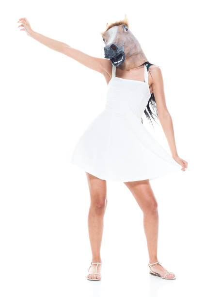 istock Cute female wearing a horse head 1150306009