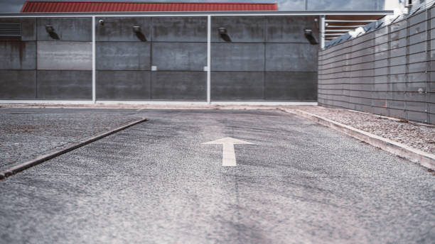 istock Asphalt road with an arrow marking 1150306569