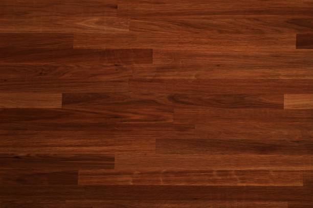 istock parquet wood texture, dark wooden floor background 1150308701