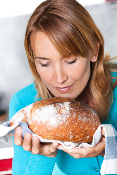 istock woman smelling bread 1150311135