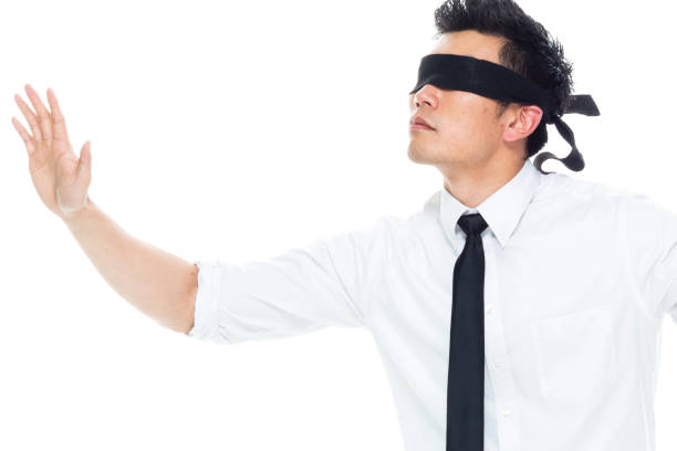 istock Handsome Asian Businessman - is wearing a blindfold 1150313689